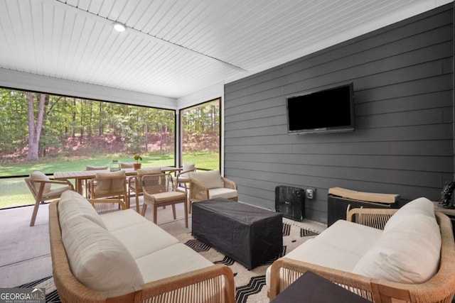 sunroom with outdoor lounge area