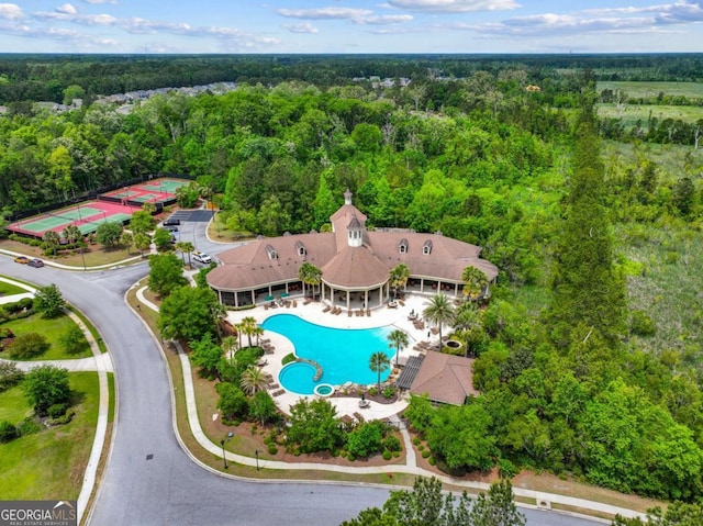 aerial view featuring a view of trees