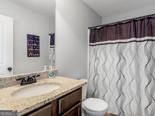 full bath with vanity, toilet, and a shower with curtain