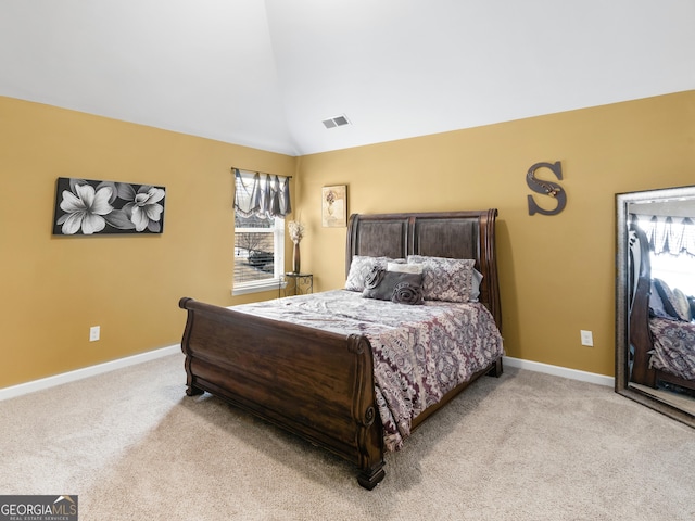 carpeted bedroom featuring visible vents, baseboards, and lofted ceiling