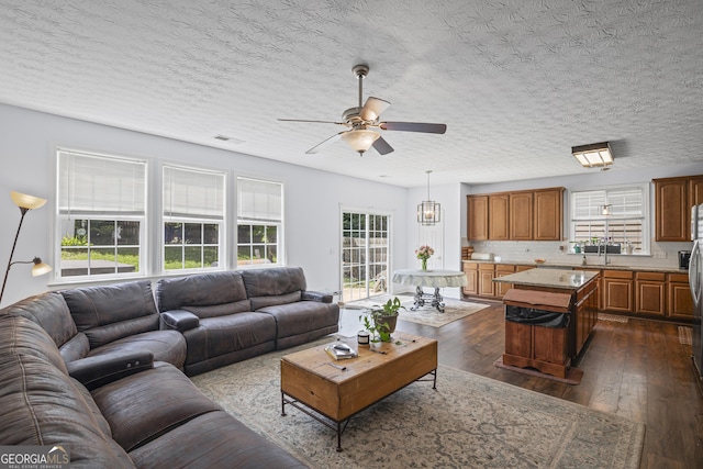 35 Timber Ln, Newnan, GA 30265 - living room with ceiling fan and dark wood-style floors