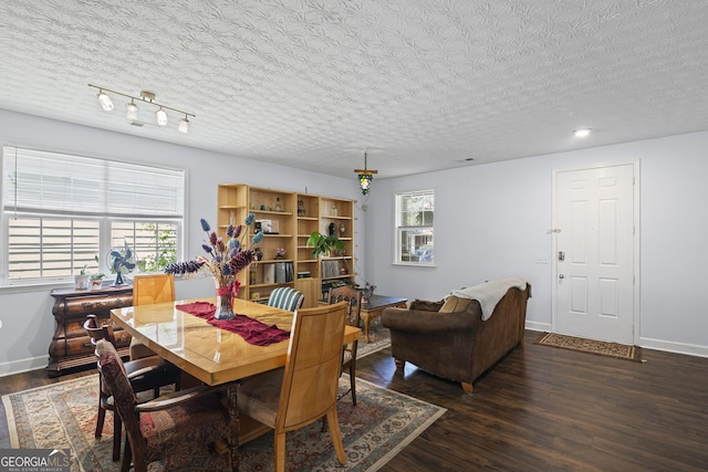 35 Timber Ln, Newnan, GA 30265 - dining area featuring a textured ceiling and dark wood-type flooring