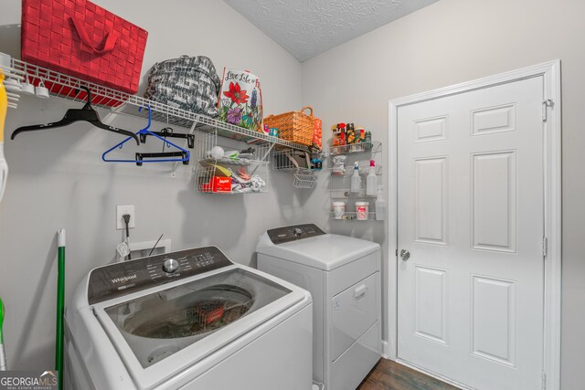 35 Timber Ln, Newnan, GA 30265 - washroom with washer and dryer and dark wood finished floors