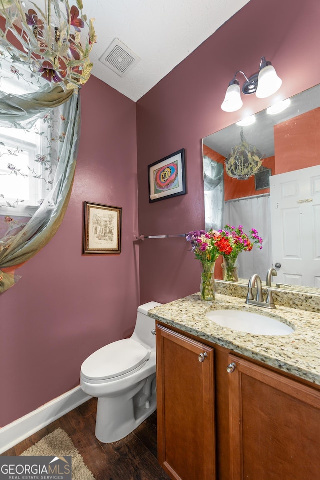 35 Timber Ln, Newnan, GA 30265 - half bathroom featuring vanity and wood finished floors