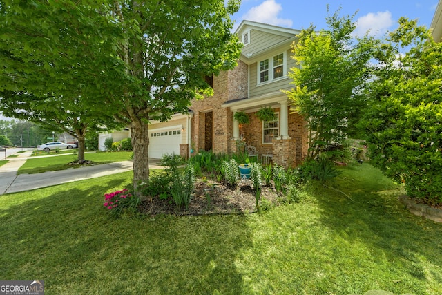 35 Timber Ln, Newnan, GA 30265 - view of property hidden behind natural elements featuring brick siding, driveway, a front lawn, and an attached garage