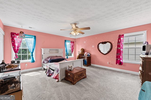 35 Timber Ln, Newnan, GA 30265 - bedroom with carpet flooring, a textured ceiling, and ceiling fan