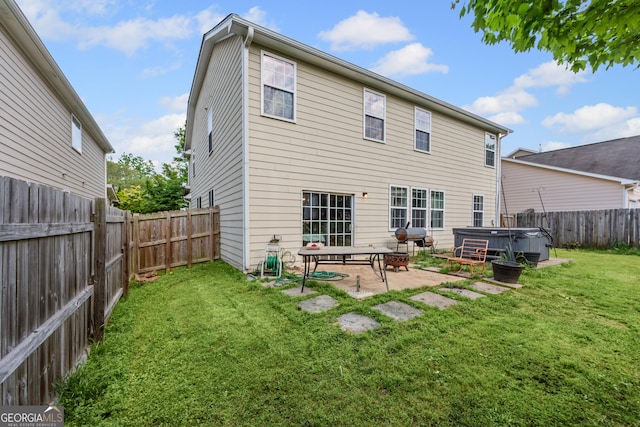 35 Timber Ln, Newnan, GA 30265 - back of property with a hot tub, a patio area, and a fenced backyard