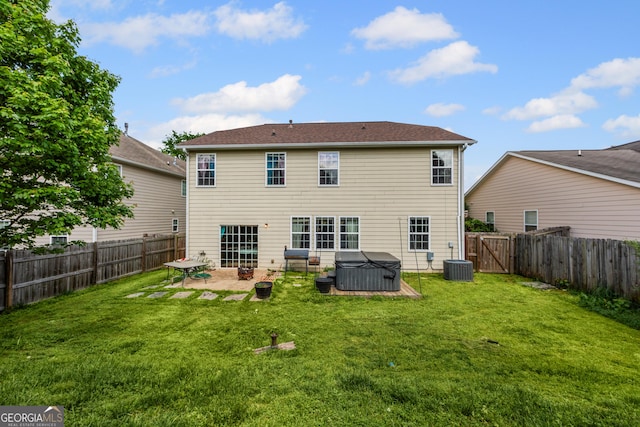 35 Timber Ln, Newnan, GA 30265 - rear view of property featuring a hot tub, a patio, a fenced backyard, and a gate