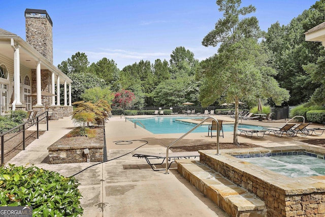 35 Timber Ln, Newnan, GA 30265 - community pool with a hot tub and a patio