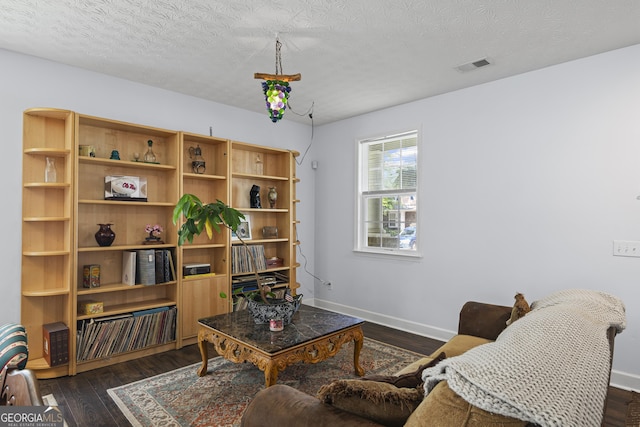 35 Timber Ln, Newnan, GA 30265 - living room with dark wood-style flooring and a textured ceiling