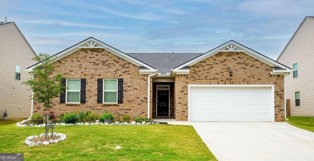 5344 Flat Rock Pt, Stonecrest, GA 30038 - view of front of house featuring brick siding, an attached garage, driveway, and a front yard