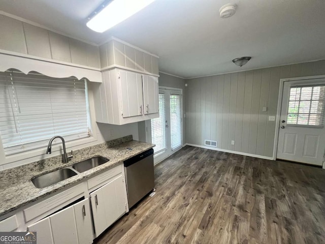 1263 Shoreham Dr, Atlanta, GA 30349 - kitchen featuring dishwasher, visible vents, a sink, dark wood-type flooring, and white cabinets