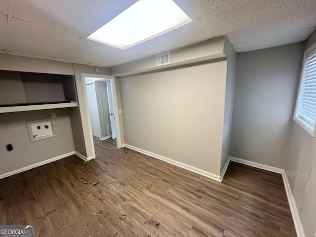 1263 Shoreham Dr, Atlanta, GA 30349 - basement with baseboards, visible vents, and wood finished floors