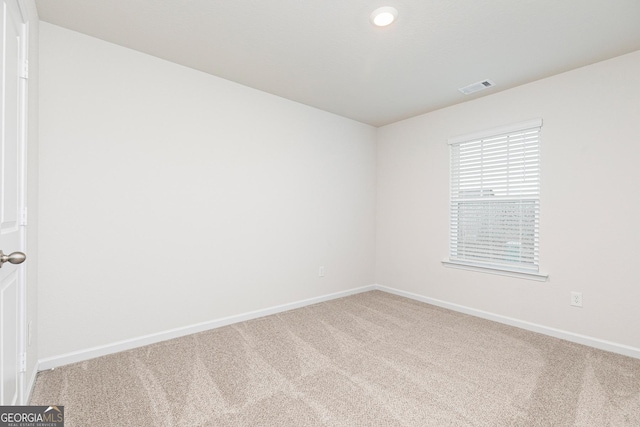 244 Oliver Dr, Locust Grove, GA 30248 - carpeted spare room featuring visible vents and baseboards