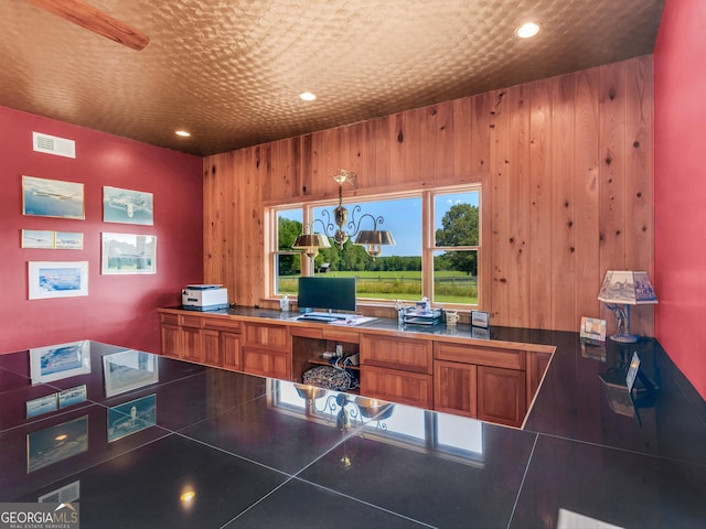 office with recessed lighting, wood walls, and visible vents