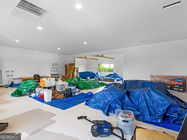 garage featuring recessed lighting and visible vents