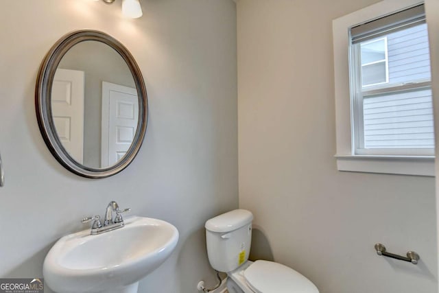 6468 Pierless Ave, Sugar Hill, GA 30518 - bathroom featuring a sink and toilet
