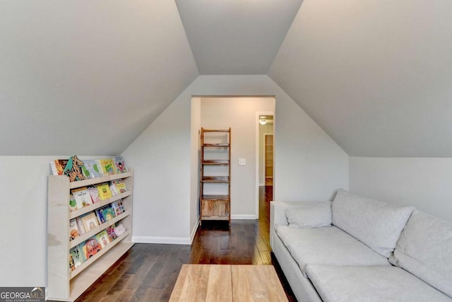 6468 Pierless Ave, Sugar Hill, GA 30518 - living area with baseboards, lofted ceiling, and wood finished floors