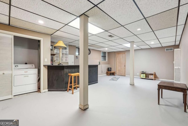 3679 Regent Dr NW, Kennesaw, GA 30144 - finished below grade area featuring visible vents, washer / dryer, recessed lighting, a paneled ceiling, and a bar