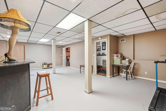 3679 Regent Dr NW, Kennesaw, GA 30144 - finished basement with baseboards, a drop ceiling, and visible vents
