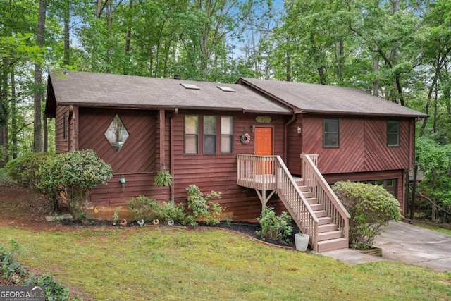 3679 Regent Dr NW, Kennesaw, GA 30144 - view of front of home featuring an attached garage, driveway, and a front lawn