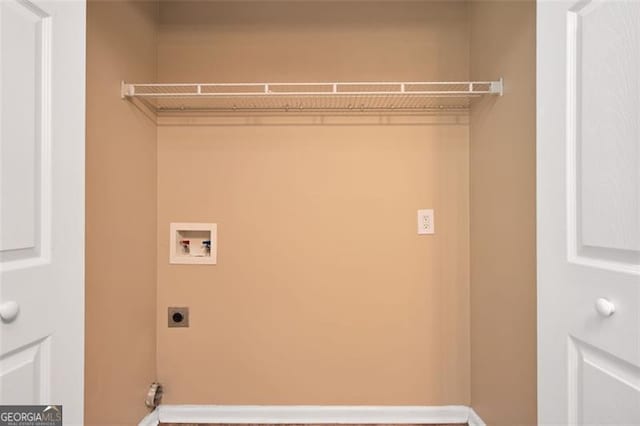 145 Tara Way, Covington, GA 30016 - laundry area featuring hookup for an electric dryer and washer hookup