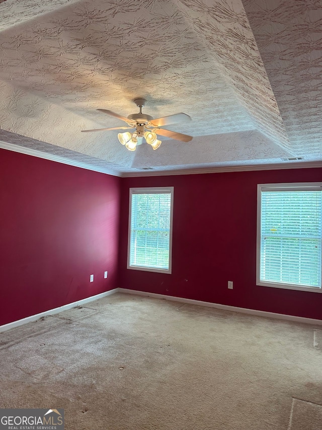 3218 Watson Woods Way, Loganville, GA 30052 - carpeted spare room featuring baseboards, ornamental molding, and ceiling fan