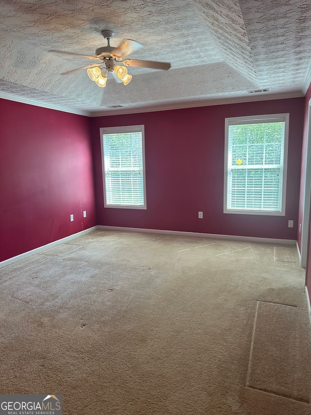 3218 Watson Woods Way, Loganville, GA 30052 - empty room featuring ceiling fan, visible vents, crown molding, baseboards, and carpet flooring