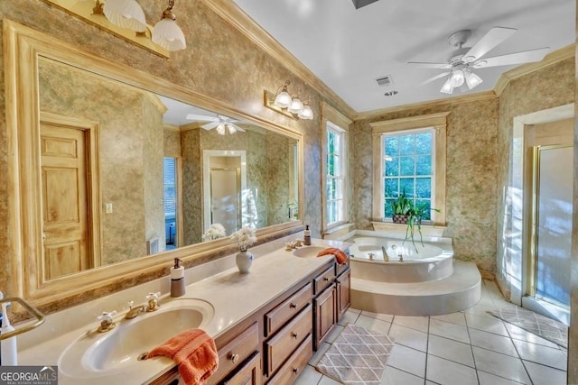 bathroom featuring crown molding, a sink, ceiling fan, and a shower stall