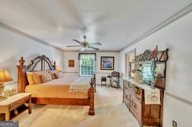 bedroom featuring ceiling fan, light colored carpet, and ornamental molding