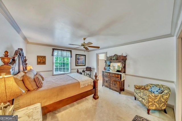 bedroom with ornamental molding, light carpet, and ceiling fan