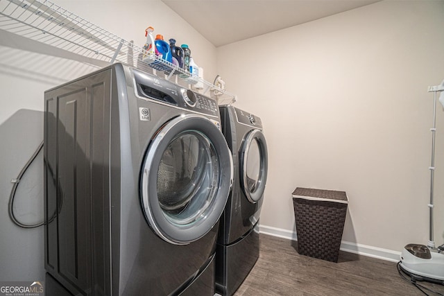 496 River Run Dr, Dallas, GA 30132 - washroom featuring independent washer and dryer, wood finished floors, and baseboards