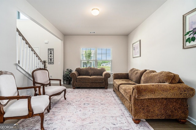 496 River Run Dr, Dallas, GA 30132 - living room with stairs, baseboards, and light wood-style flooring