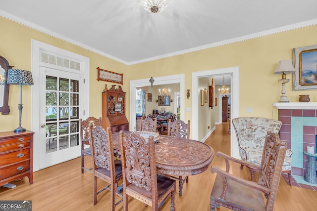 157 Hartwell St, Royston, GA 30662 - dining area featuring a notable chandelier, ornamental molding, and wood finished floors