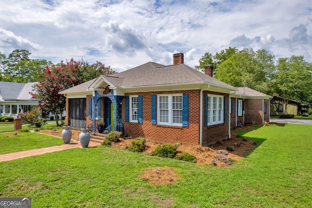 157 Hartwell St, Royston, GA 30662 - bungalow with a chimney, a front lawn, and brick siding