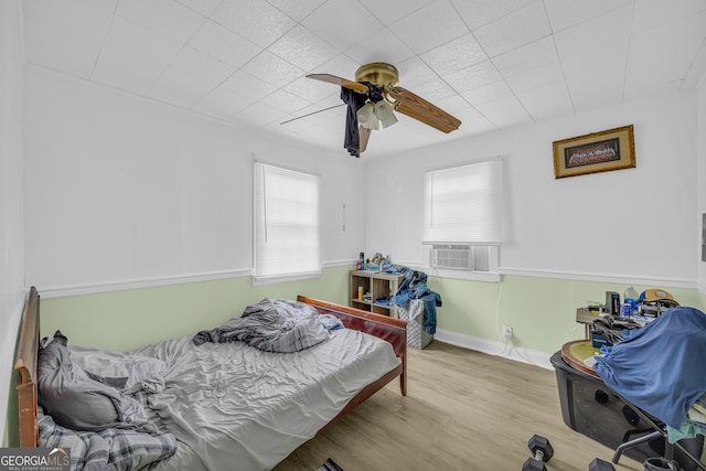 157 Hartwell St, Royston, GA 30662 - bedroom featuring ceiling fan, wood finished floors, and cooling unit