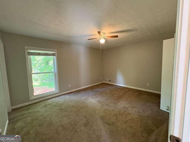 1231 Providence Way, Lawrenceville, GA 30046 - unfurnished room with a textured ceiling, carpet floors, and a ceiling fan