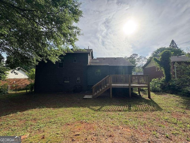 1231 Providence Way, Lawrenceville, GA 30046 - rear view of house featuring stairs and a wooden deck
