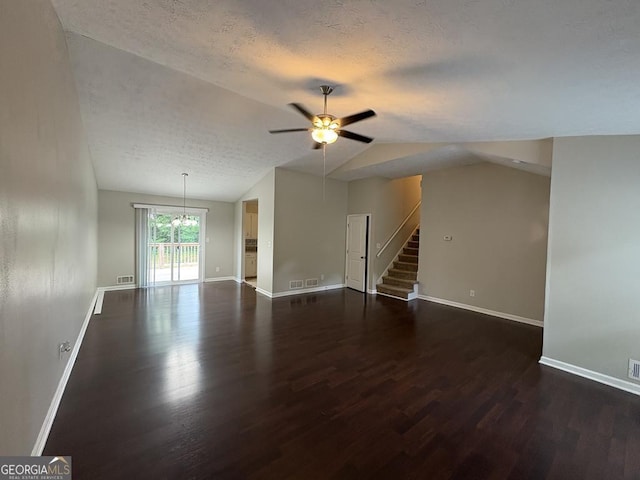 1231 Providence Way, Lawrenceville, GA 30046 - unfurnished living room featuring wood finished floors, ceiling fan, a textured ceiling, stairway, and lofted ceiling