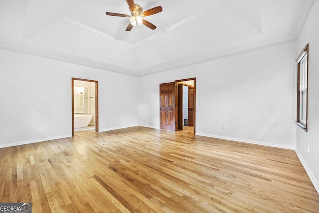 4805 Forest Way Ct NE, Marietta, GA 30066 - spare room with a tray ceiling, light wood finished floors, a ceiling fan, and crown molding