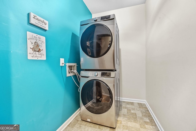4805 Forest Way Ct NE, Marietta, GA 30066 - laundry area featuring stacked washer / dryer and stone finish flooring