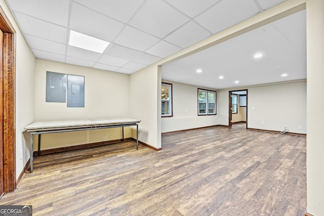 4805 Forest Way Ct NE, Marietta, GA 30066 - unfurnished room featuring electric panel, wood finished floors, recessed lighting, and a drop ceiling
