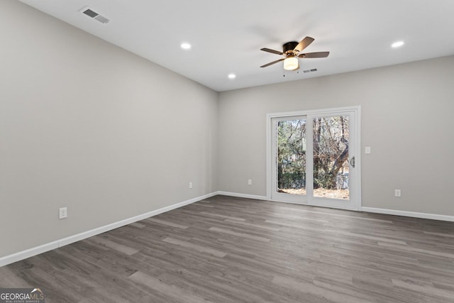 6093 Camden Forrest Ct, Riverdale, GA 30296 - empty room with baseboards, ceiling fan, and wood finished floors