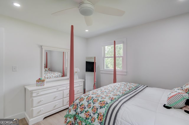 bedroom featuring baseboards, recessed lighting, ceiling fan, and light wood-style flooring
