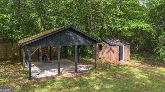 6104 Floyd St NE, Covington, GA 30014 - view of shed featuring a carport