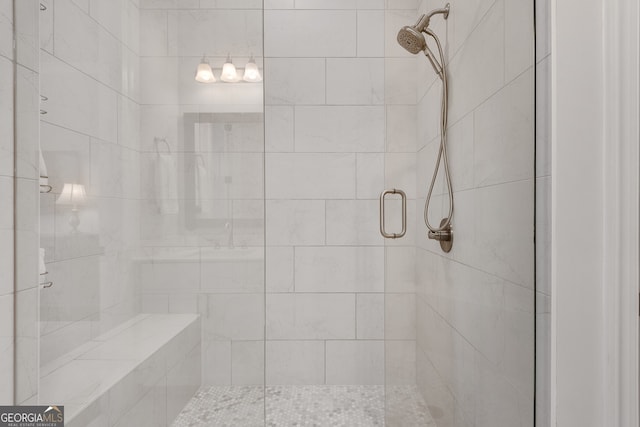 full bathroom with a shower stall