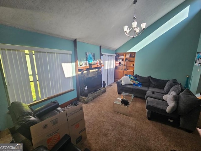 living area with carpet flooring, a textured ceiling, an inviting chandelier, and vaulted ceiling