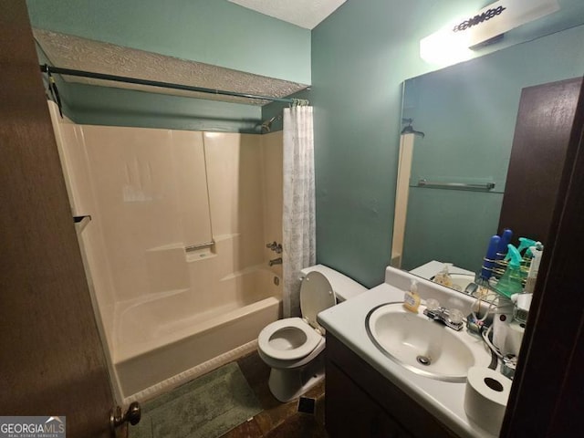 full bath featuring vanity, shower / bath combo, and toilet