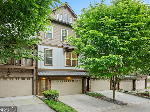 3231 Chutney Ct, Avondale Estates, GA 30002 - townhome / multi-family property featuring a garage, metal roof, a standing seam roof, board and batten siding, and concrete driveway