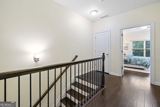 3231 Chutney Ct, Avondale Estates, GA 30002 - corridor featuring baseboards, visible vents, dark wood finished floors, and an upstairs landing